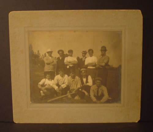 Early Base Ball Players with Arms Folded and Bat